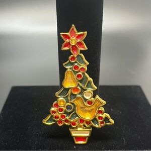 This is a vintage Beatrix Christmas tree brooch pin with enamel and rhinestones.
